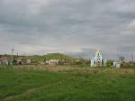 Церковь. На заднем плане мыс Фонарь - самая восточная точка Крыма.